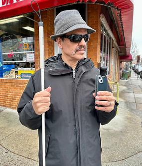 A user waiting at an intersection to use the OKO application_edited_edited.png
