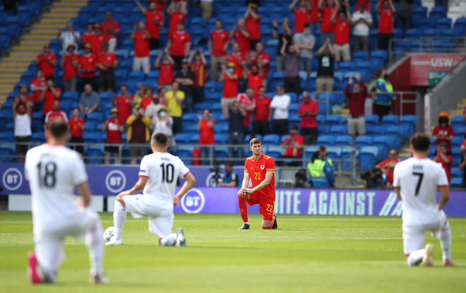 Wales' Chris Mepham takes the knee prior to their game against Albania on Saturday. Picture: PA