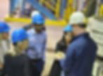 On a site visit to GranBio’s Thomaston, Georgia, facility, Amazon team members observe the waste-wood feedstock used to produce lower-carbon fuel. (Photo: Amazon.com Inc.)