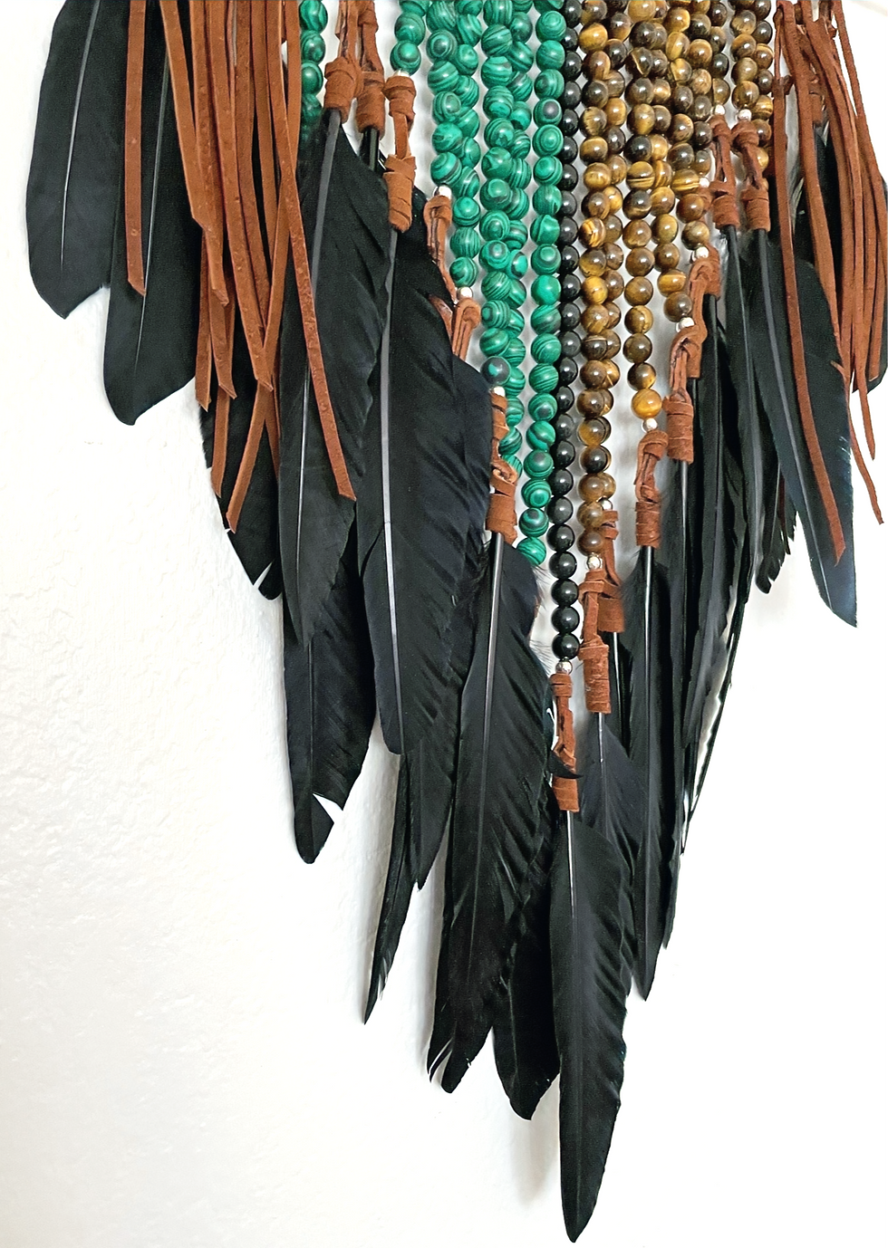 Thumbnail: Rich Earth Tone Crystals with Black Feathers on Lucite