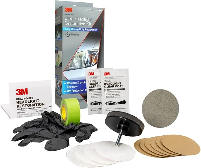 3M Ultra Headlight Restoration Kit with sanding discs, clear coat wipes, pad holder, gloves, and tape