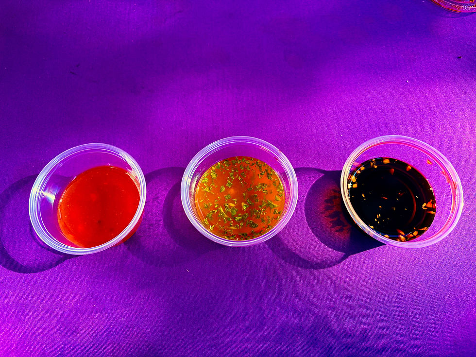 A variety of homemade dipping sauces with vibrant colors