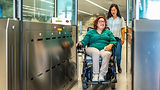 woman-in-a-wheelchair-and-caregiver-exiting-the-me-2024-12-10-03-18-09-utc_edited.jpg