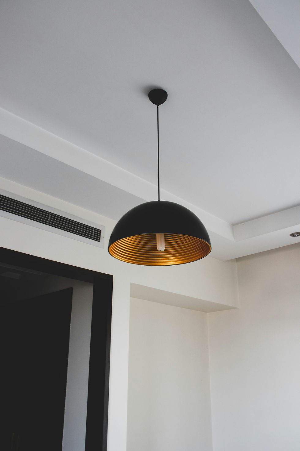 elegant black lighting fixture for holistic interior design entryway