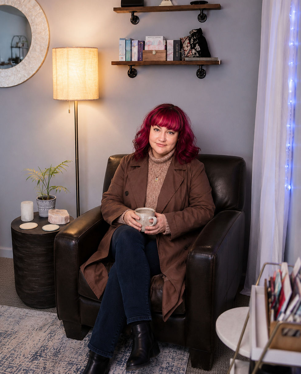 Becca reflecting with soft light and aura colors, representing intuitive readings and spiritual insight.