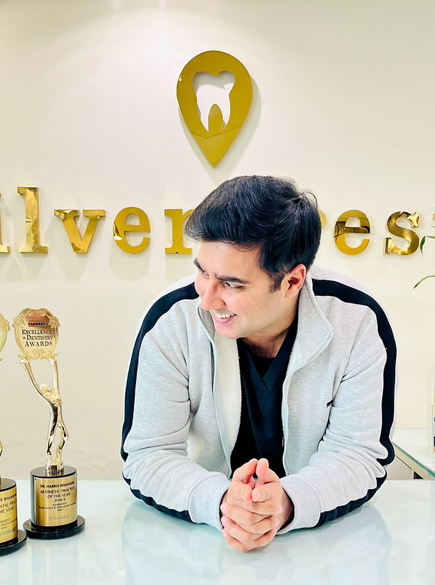 Dr. Harris Bhandari, Endodontist and Cosmetic Dentist at Silver Crest Dental Studio Delhi – Masters in Endodontics from Unive