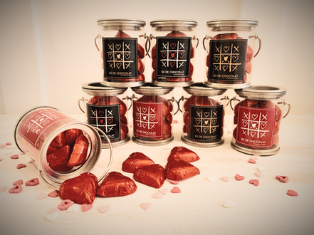 Mini Tins with Solid heart chocolates each wrapped in red foil