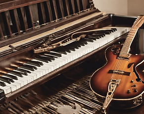 guitar attached to piano combine.png