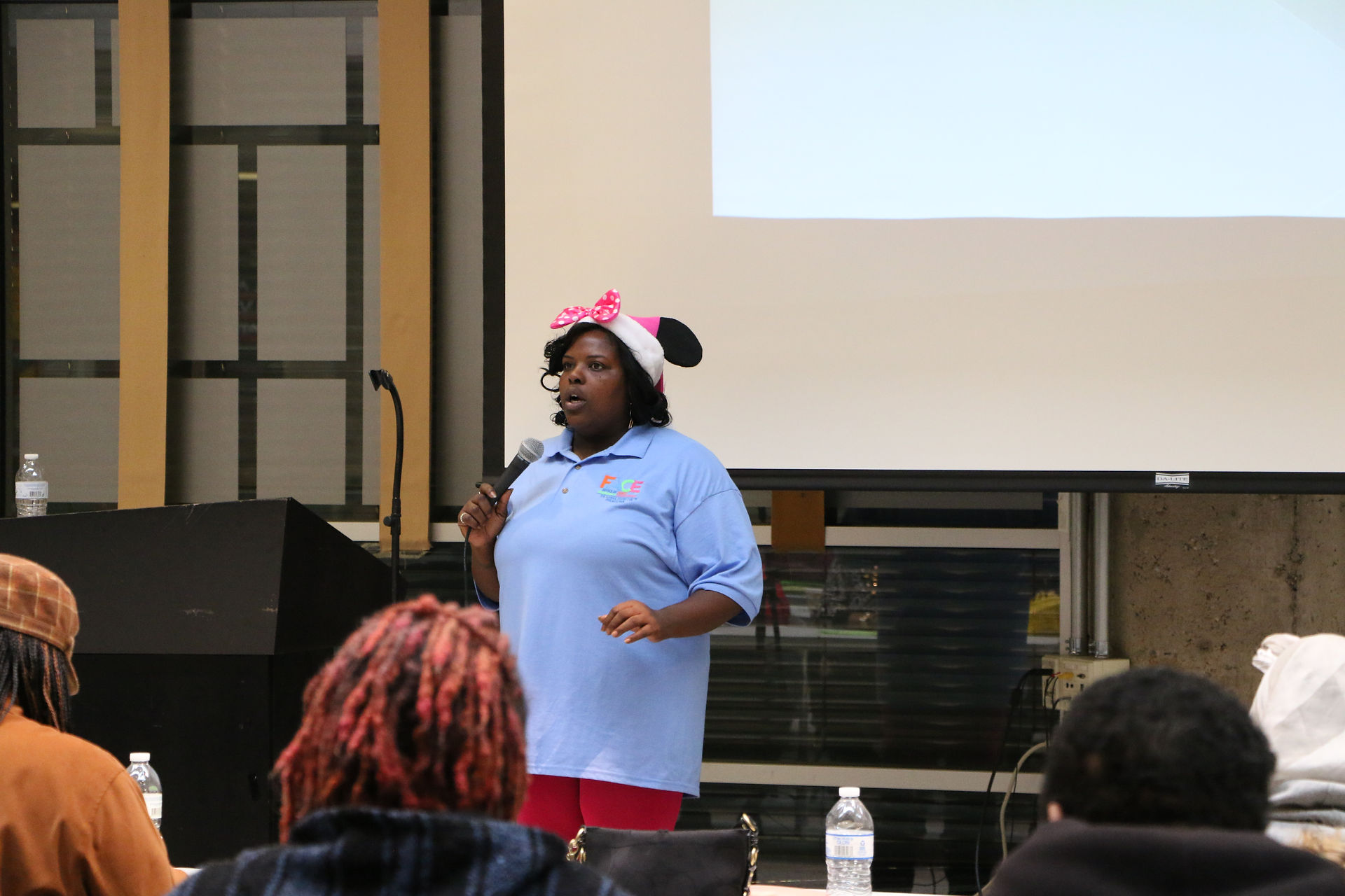 Customer Support Liaison Sheila Armstrong addresses the audience