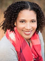 smaller Headshot Tia Barlow red_Final (1).jpg