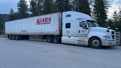 Tri-Axle dry van hauling packaged freight across Canada