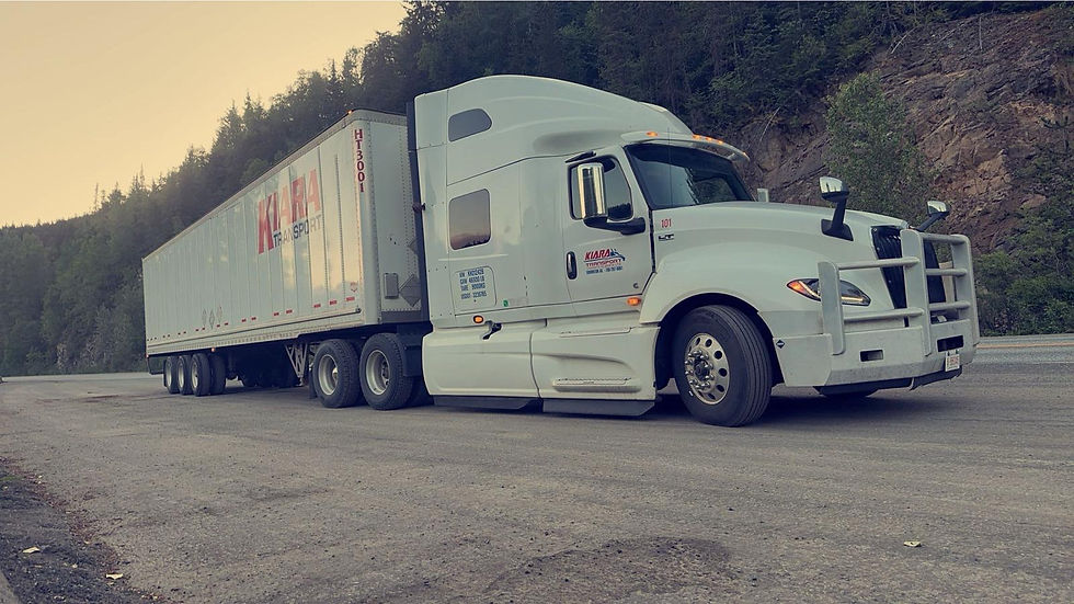 Kiara Transport truck hauling freight through Canadian Rockies