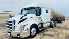 Kiara Transport Super B truck hauling oil across Alberta highway