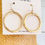 Thumbnail: Matte Gold Hammered Drop Circle Earrings