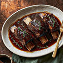 Apple Cider Braised Short Ribs Slow-cooked until the meat falls from the bone — a Canadian Thanksgiving main built on reduced Ontario cider.
