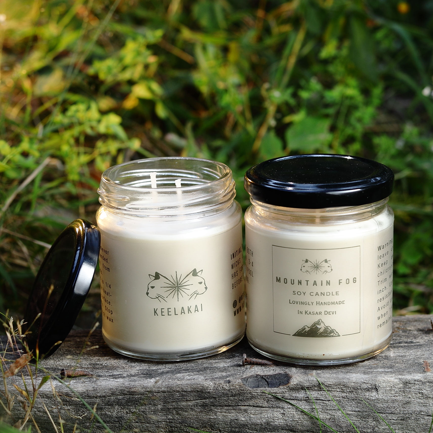 two candle jar with an open and closed lid