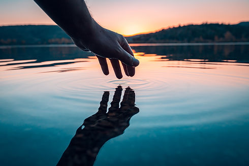 Pivot Point Manifesto BG image Hand Over Water.jpg