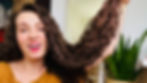 Katherine holding her very long hair