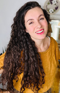 woman with long curly healthy hair