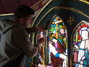 Damien Walker restoring the historic interior of the Church of the Holy Passion in Amberley, winner of the 2019 Resene Total Colour Heritage Award.