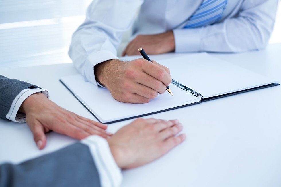 Business people in discussion in an offi