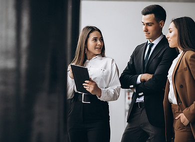 male-female-business-people-working-tabl