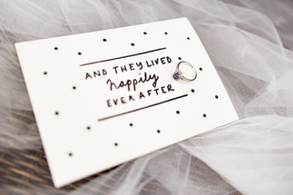 Happily ever after card and engagement ring at morning prep at Dragon Hall Norwich wedding