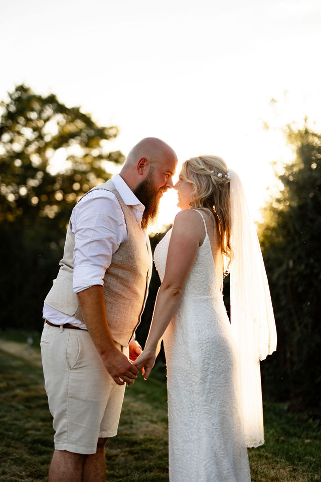Fun and relaxed sunset photos during golden hour at an alternative tipi wedding