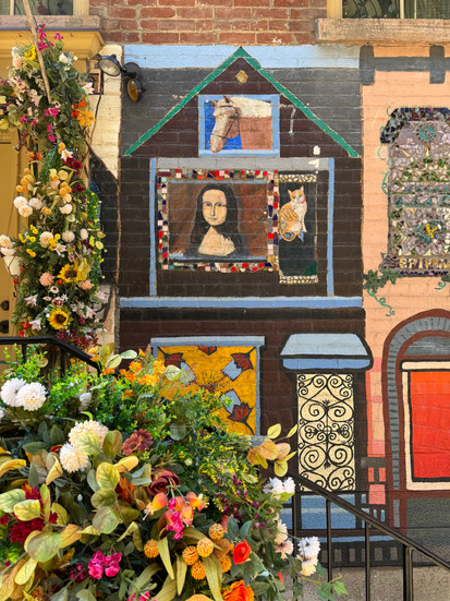 Street art on the side of a historic brick building in Easton, PA.