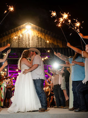 Couple Kissing During Grand Exit