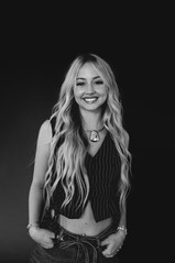 Beauty branding photography for independent stylists, featuring hair extension artists in studio with modern, minimal styling.