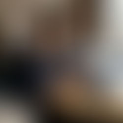 Small business owner using mobile in café