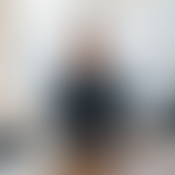 Cafe owner recording product demo at counter