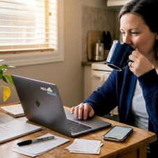 Business owner refining marketing in home office