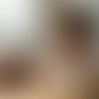 Small business owner filming video at kitchen table