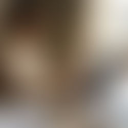 Business owner sending emails at home table