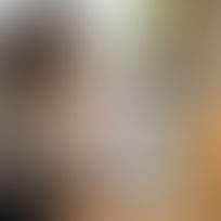 Small business owner multitasking at home desk