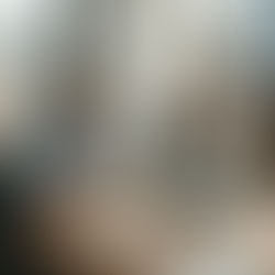 Small business team in bright corner office collaborating