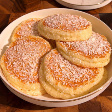 Sofficissimi pancake al cocco con cocco rapè. Ricetta di Pancake Eden.