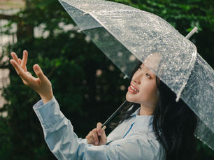 Girl dancing in the rain