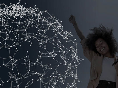 A person with curly hair and a joyful expression raises an arm, holding a phone. A digital network pattern is in the dark background.