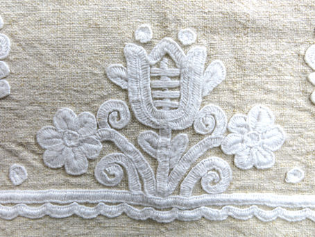 Vintage embroidery on hemp fabric