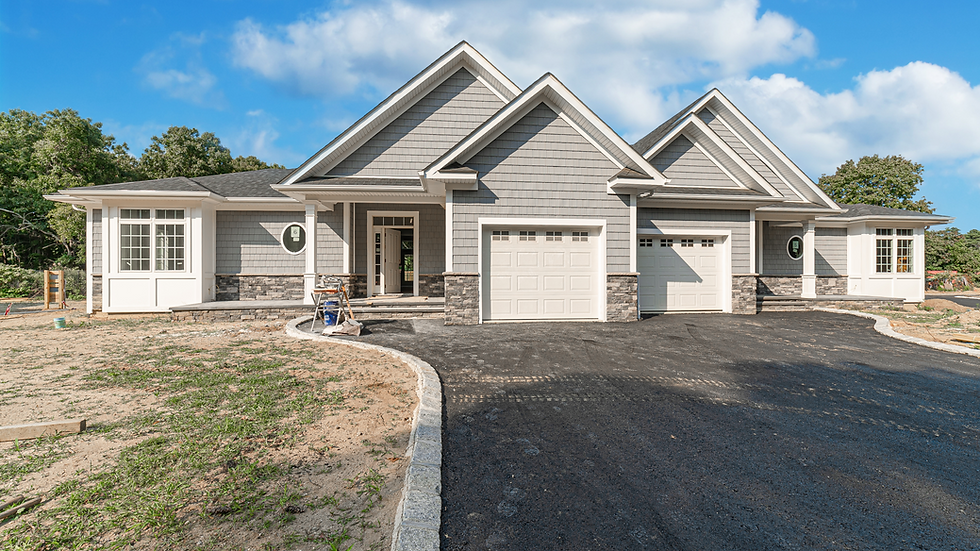 Front image of Islandia home under construction.