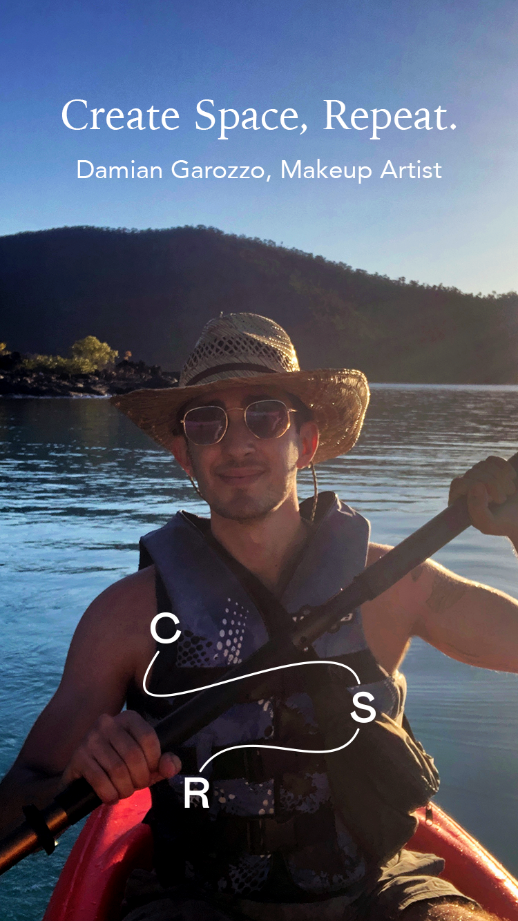 Damian Garozzo kayaking down a river alone with trees and birds in the background 