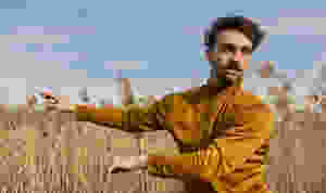 Georges Hann dancing in a field helping his mental health during the covid pandemic