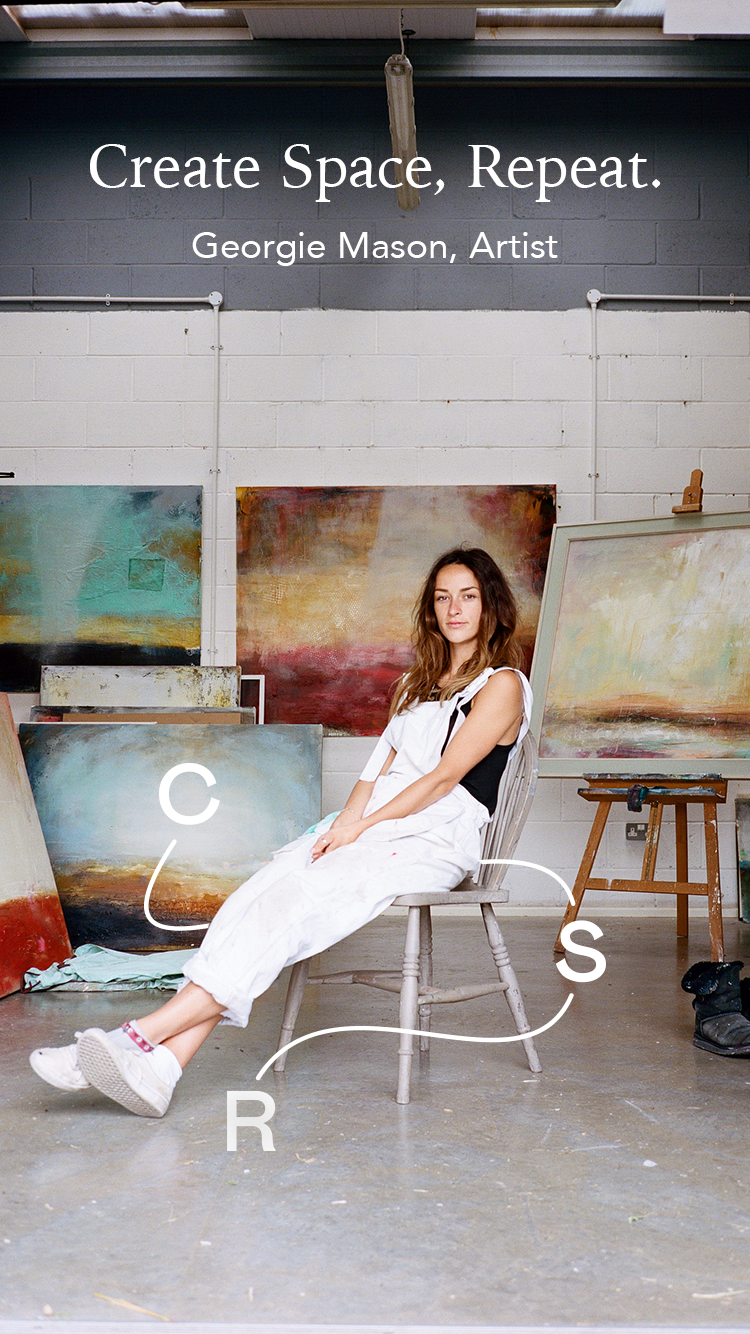 Georgie Mason, artist, relaxing in her studio