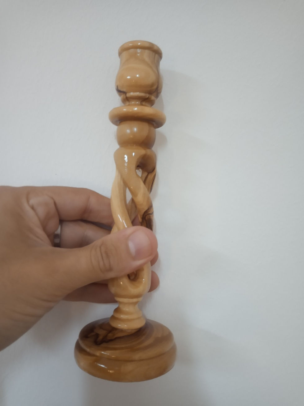 Candelabra medium sized in spiral made of olive wood