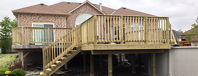 Wood deck with stairs and privacy rail – custom deck construction in Ontario
