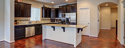 Modern kitchen with dark cabinets and island – full kitchen renovation project