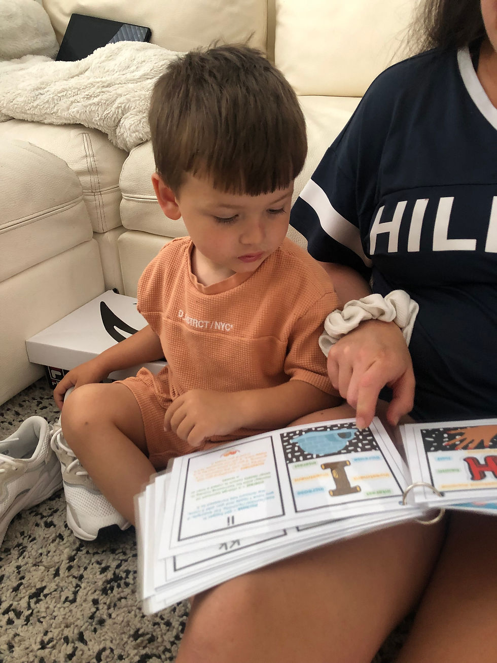 Toddler reading finance flashcards